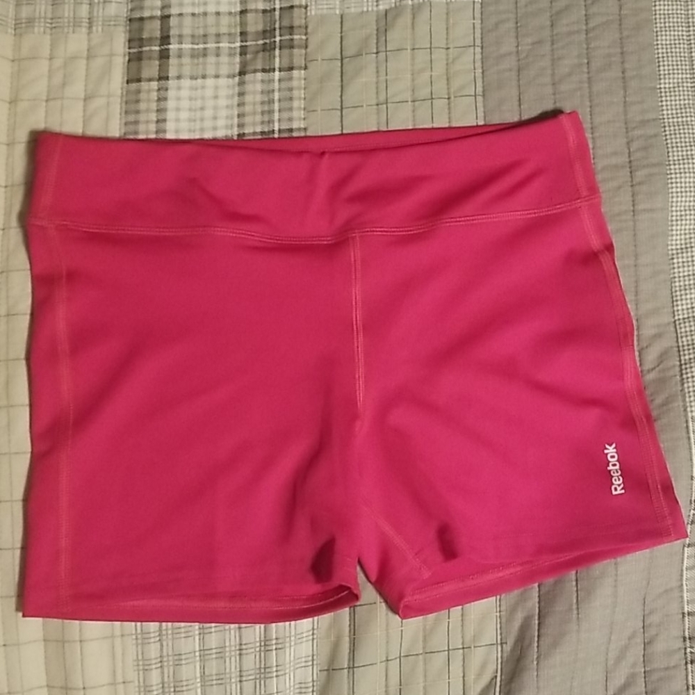 Pink reebok athletic shorts